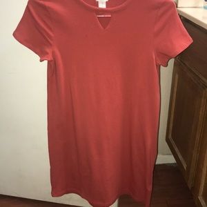 In selling a red/ pinkish dress